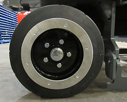 Anti-spark wheel covers on the Bailey EX Scissor Lift