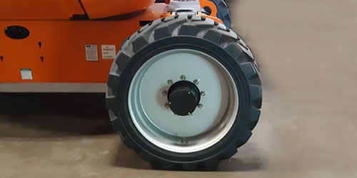 Tires off of a JLG 460 Boom Lift